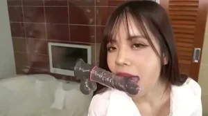 Uncensored. A beautiful half-Japanese, half-Thai girl. Black hair, slender, big breasts, beautiful shaved pussy, blowjob